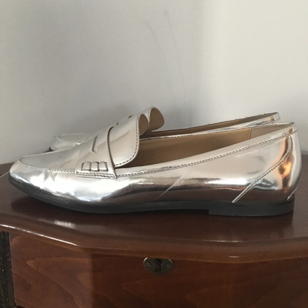 Michael Kors silver Connor loafers.